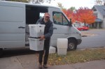 John unloading boxes at the pickup site
